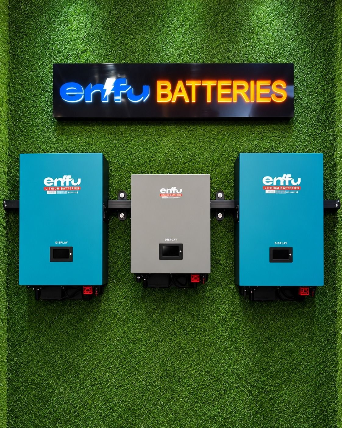 Enfu wall-mounted batteries under the Enfu Batteries sign